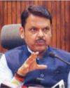 CM Fadnavis meets minister accused of shielding killer of village official