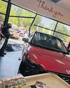 Woman taken to hospital after crashing into supermarket Woman taken to hospital after crashing into supermarket9