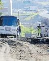Bus owners take it upon themselves to fix Kennedy Road's potholes5