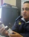 TOP COP HANGS UP LAPELS TOP COP HANGS UP LAPELS