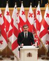 New Georgian president sworn in; predecessor says he is not legitimate leader