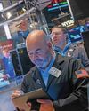 Wall Street hits week's low in thin trading, elevated yields add pressure