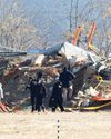 S Korean airport embankment in focus after deadly air crash