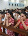 Pope works on saints from hospital as Catholics pray for his recovery