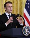 French president warns Ukraine peace can't mean 'surrender'