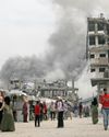 Gaza air strikes kill over 100 as manhunt unfolds in West Bank