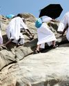 Pilgrims pray, shirk sun,24