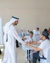 Hamdan lauds creativity of people of determination painting Flag Day mural13