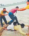 2 men ‘bridge gap’ to help students cross rain-hit road22