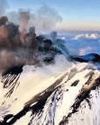{ ITALY } IT IS EUROPE'S MOST ACTIVE VOLCANO Mount Etna emits ash, smoke38