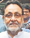 Court frames charges against Nawab Malik55