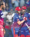 Starc, openers shine in DC win as last-four race heats up52
