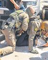 Snatch and detain: US officials defend aggressive immigration raid tactics65