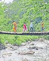 Risking their lives, villagers of Nainital forced to use fragile wooden bridge14