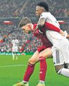 Liverpool beat Real at home as Bradley holds Vinicius Jr65