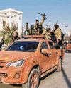 Syrian rebel assault widens as Assad races to defend Homs