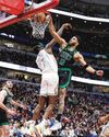 TATUM REACHES BIRD'S HEIGHTS