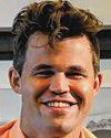 Carlsen faces legal threat from Fide