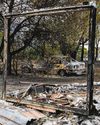 Australian bushfires raze homes, cut power to tens of thousands20