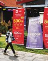 Simba's M1 bid collapses; Singtel shares slide as S'pore business weakens30