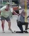 Video shows bloody fight in capital as kids look on13