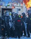 Arrested as he 'urinated at riot'29