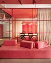 Vibrant red accents define the dynamic interiors of CH Office