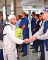 CM Omar welcomes 1st batch of returning Hujjaaj at Srinagar airport9