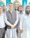 Sunil exchange Eid greetings with Muslim brethren at Bali Lower Madrasa Faiz-Aam14