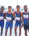 Relay team win heat before rain delays final