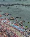 Sanitation workers at Maha Kumbh Mela clean ghats of Triveni Sangam