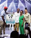 Caribbean Crooner Sherwin Gardne is surprised during album release concert with plaque celebrating 2 Billion Tik Tok views Caribbean Crooner Sherwin Gardne is surprised during album release concert with plaque celebrating 2 Billion Tik Tok views12