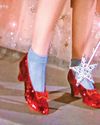 Iconic 'ruby slippers' auctioned for $28 mn