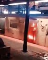 Woman set on fire in subway train by unknown man in US