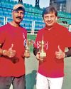 Anand and Naren win men's 45 plus doubles trophy