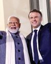 PM Modi greeted by 'friend' Macron