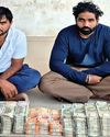 Duo caught with Rs 50L cash0