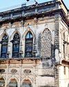 Who demolished Parveen Babi's 200-yr-old home in Junagadh?11