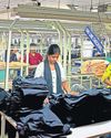 IN INDIA'S KNITWEAR CAPITAL, A SURVIVAL ACT33