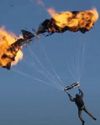 Tom Cruise sets Guinness record for most burning-parachute jumps32