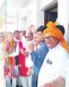 Dr Arvind Sharma unfurls BJP flag at his residence44