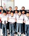 English handwriting competition held at Meera Public School YUGMARG NEWSPAPER