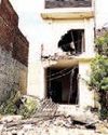Govt strikes hard in drug war: Illegal assets of drug smugglers bulldozed back to back YUGMARG NEWSPAPER