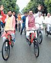 CM Saini cycles to house with Ministers, MLAs YUGMARG NEWSPAPER