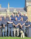 Veterans recreate ‘team photo’ at home of poppy factory founder12