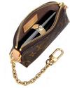 Move over, Labubu The hottest new bag charm is a $485 logo case for your makeup Move over, Labubu The hottest new bag charm is a $485 logo case for your makeup4