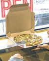 Domino's Posts Weaker U.S. Sales Growth