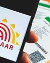 Aadhaar card agency mulls photo and QR code-only format22