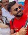 RCB Team Gets Grand Welcome At B'luru Airport, Shivakumar Gifts Kannada Flag To Virat Kohli NF Times