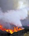 Firefighters left smoldering site before Jan. 7 Los Angeles Times